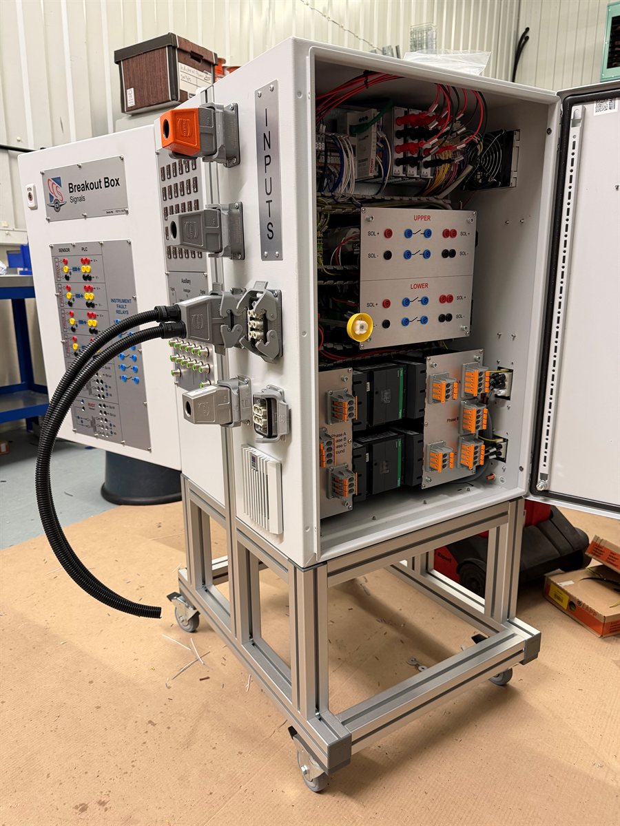 The CCS break-out box cabinet with signal breakout panel and internal wiring